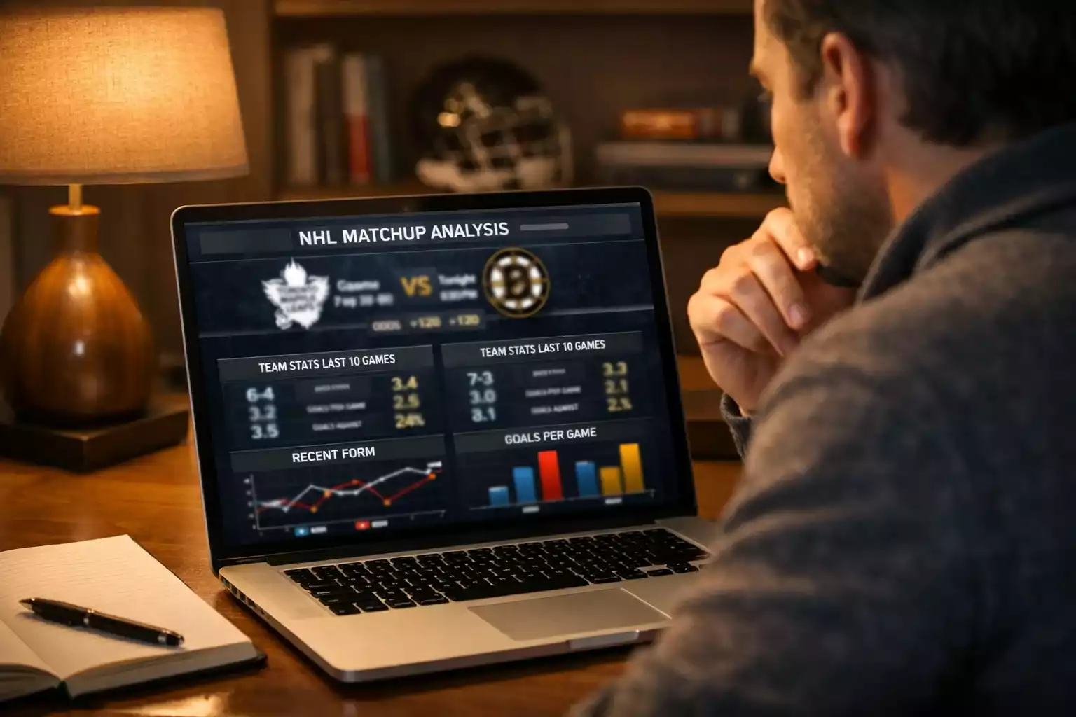 Person analyzing hockey betting data and statistics on laptop
